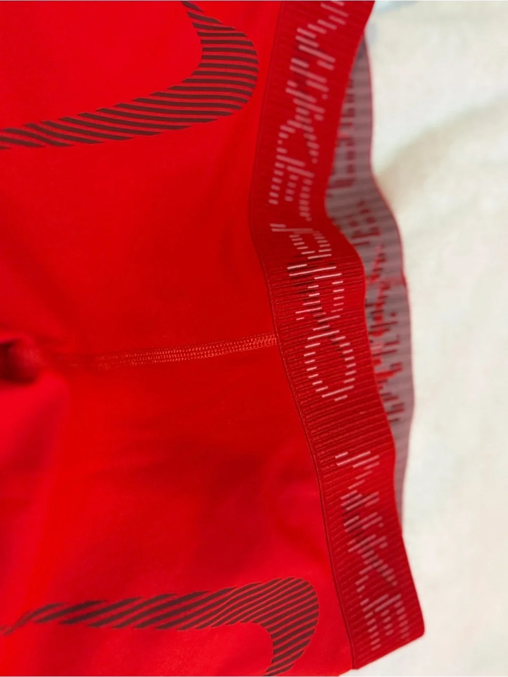Nike Women’s Red Pro Bike Shorts with Subtle Branding